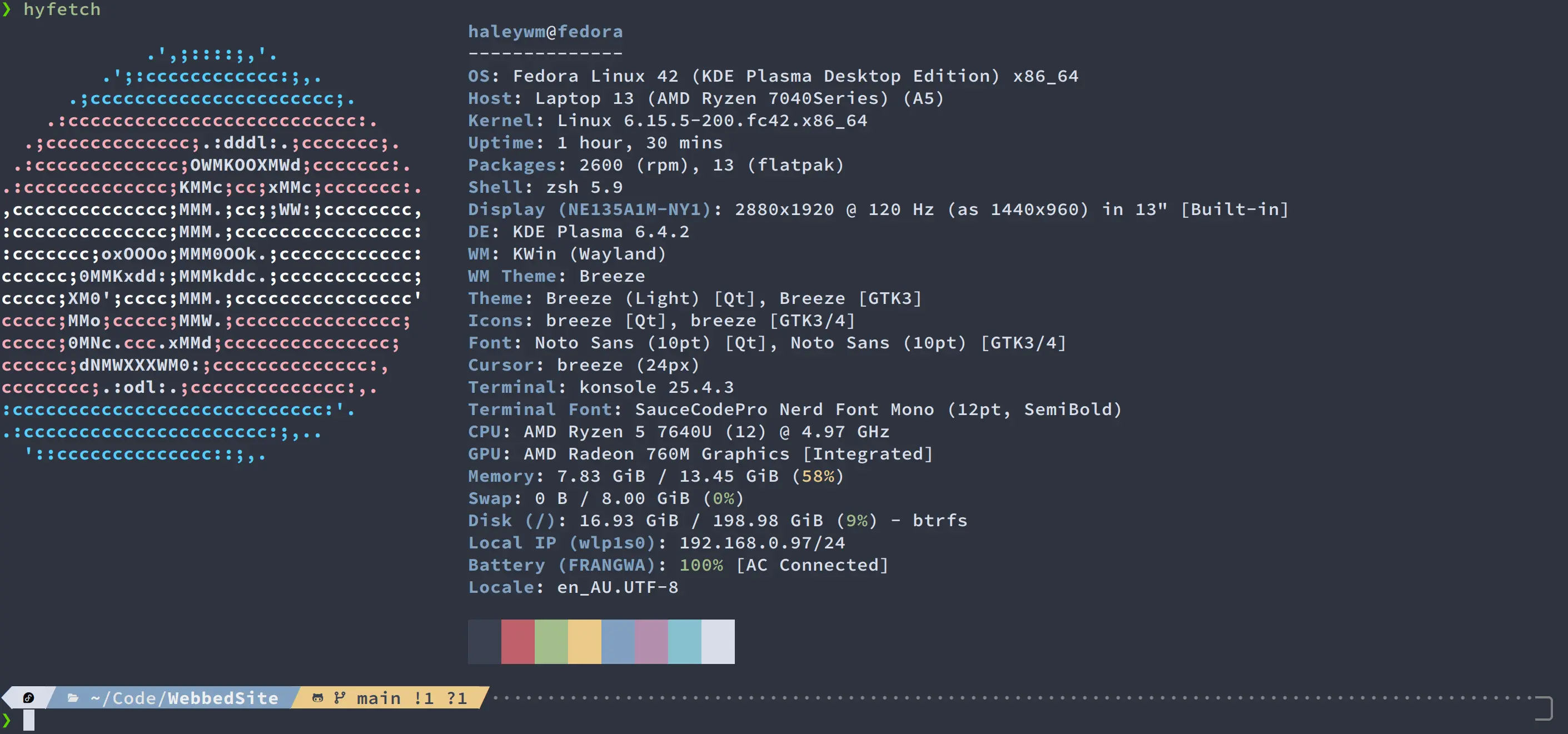 A picture of my terminal, showing the output of hyfetch, with the p10k theme and nord colour scheme.